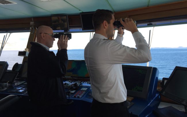 Our Captain and First Officer spotting narwhal and seals in the distance.